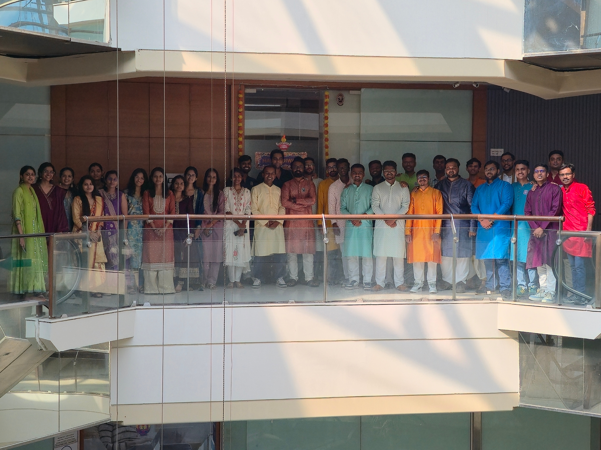 Team celebrating Diwali in traditional attire